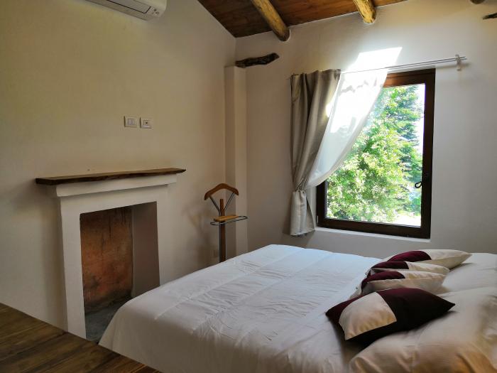 2-Zimmer-Turmrustico „Roccolo“ im ehemaligen Jagdhäuschen in idyllischer Alleinlage mit ca. 58 m² Wohnfläche und Traumseesicht