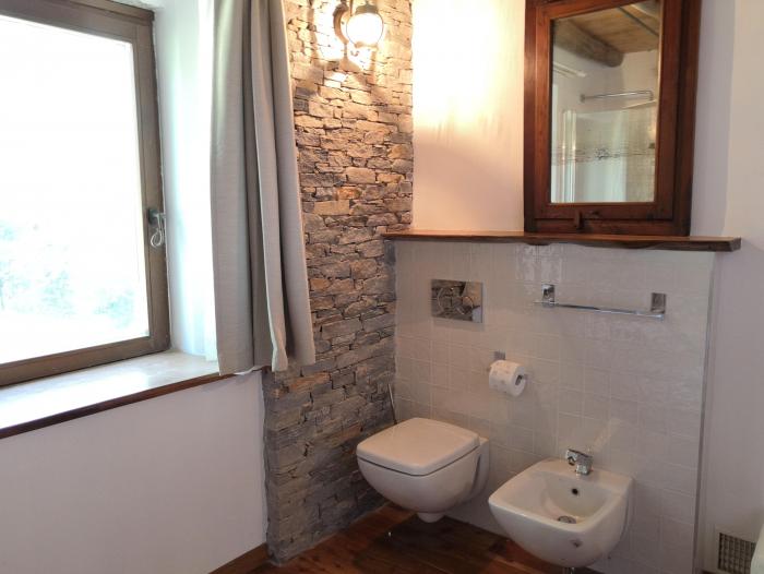 2-Zimmer-Turmrustico „Roccolo“ im ehemaligen Jagdhäuschen in idyllischer Alleinlage mit ca. 58 m² Wohnfläche und Traumseesicht