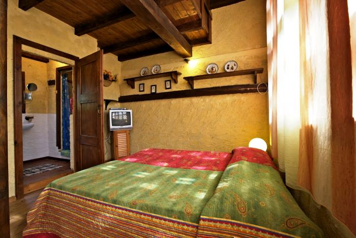 1. Schlafzimmer mit Doppelbett - Wohnung G